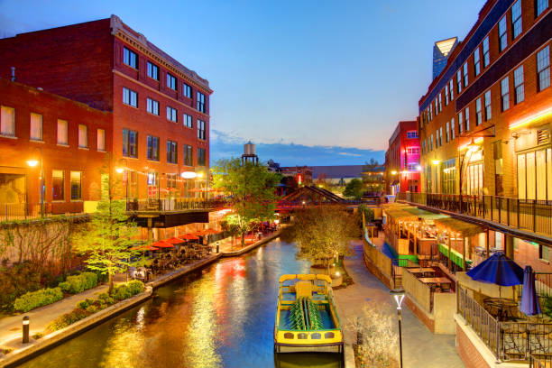 Bricktown, Oklahoma City Evening view of the Bricktown Canal in Oklahoma City. Bricktown is an entertainment district just east of downtown Oklahoma City, Oklahoma oklahoma city stock pictures, royalty-free photos & images