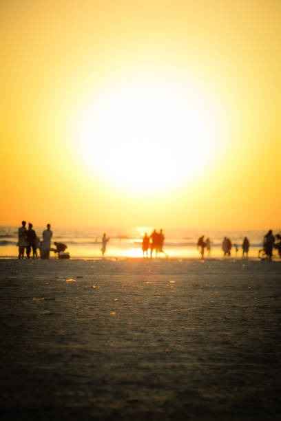 istock People on beach - stock photo 1302159446