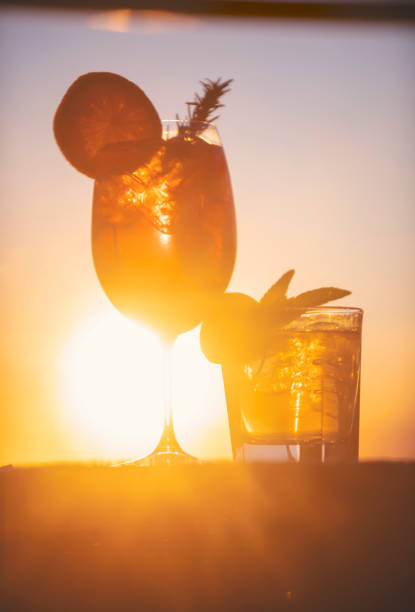Two cocktails at sunset.