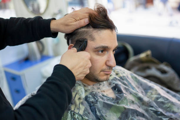 istock Man at hair salon 1302161459
