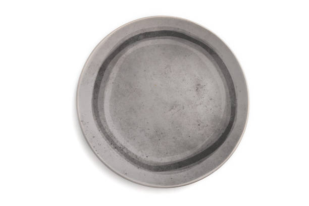 istock Empty gray ceramic plate isolated on white background. Top view, flat lay, close up. 1302162264