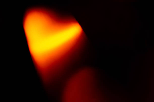 istock lens flare background valentine day blur red heart 1302174868