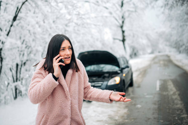 istock Woman Calling for help, her car broke! 1302174881