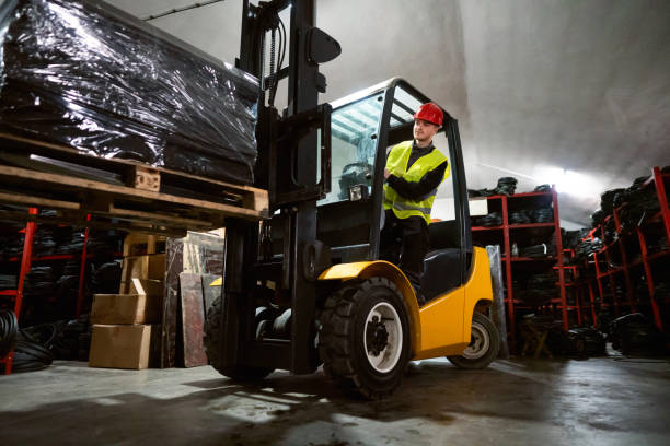 istock One forklift driver moving stack of rubber mats in a warehouse 1302175042