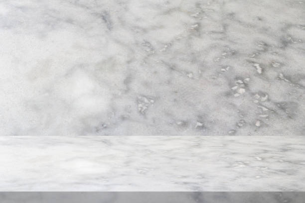 istock white marble table with natural wall texture background for mockup product display template 1302175079