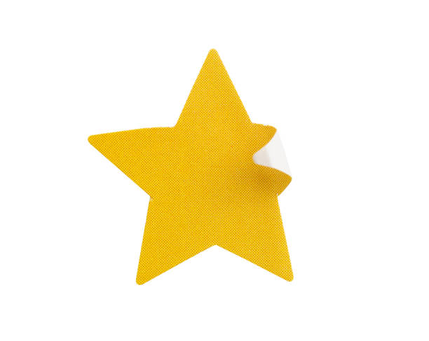 istock Yellow star shape paper sticker label isolated on white background 1302175783