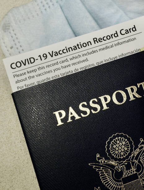 istock COVID-19, Passport, and Vaccination Record Card 1302177846