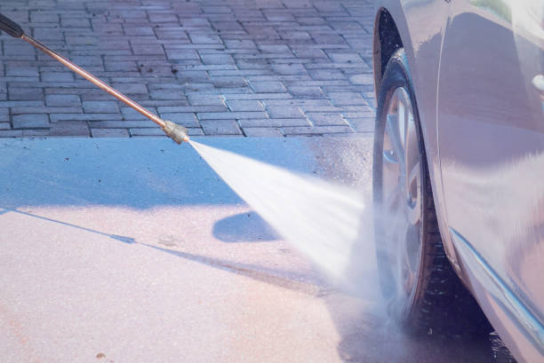 istock .Car wash self-service. The owner washes his car. 1302183663