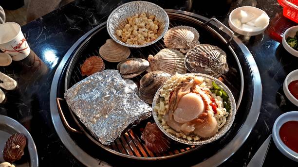 istock Grilled clams and boiled clams. 1302186136