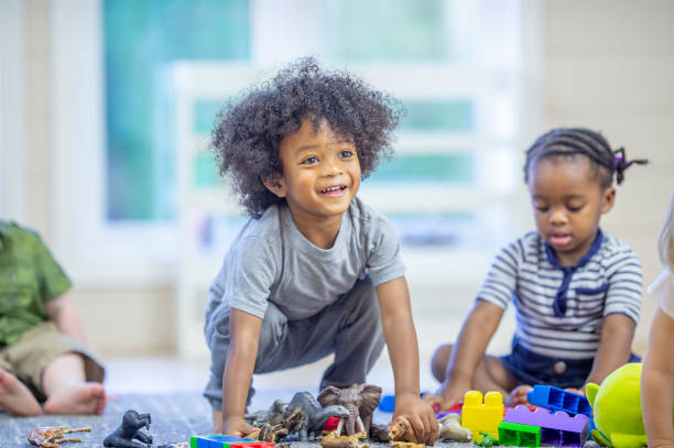 Happy Children Playing Together Stock Photo - Download Image Now