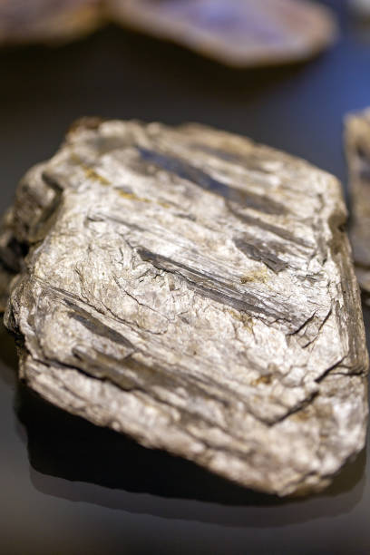 istock Mineral muscovite on black background 1302195415