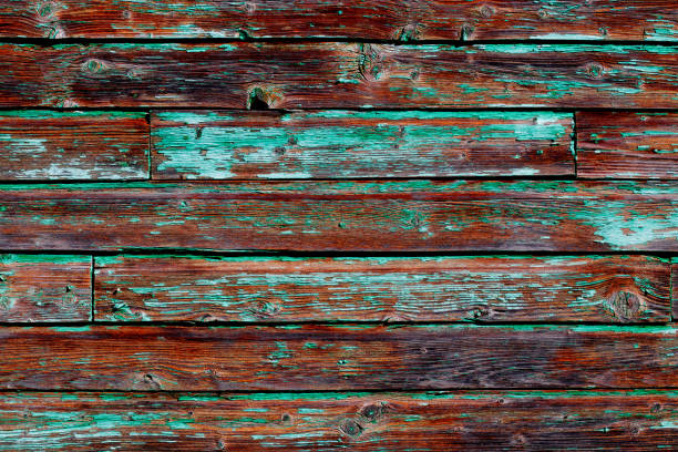 istock The surface of a brown green board wall. 1302197487