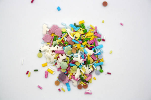 istock Confectionery multicolored sprinkles on a white background. 1302199910