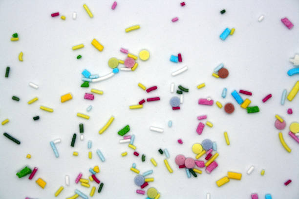istock Confectionery multicolored sprinkles on a white background. 1302199911