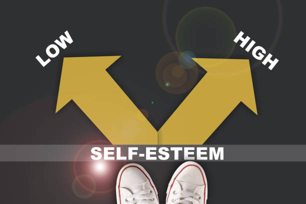 Self-esteem two direction with low and high yellow arrow on grey background Business boosting self esteem concept and improvement decision making idea low self esteem stock illustrations