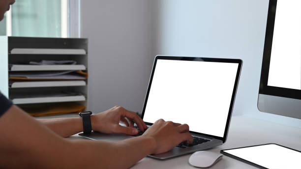 istock Cropped shot of young man using laptop computer for searching information in internet. 1302202865