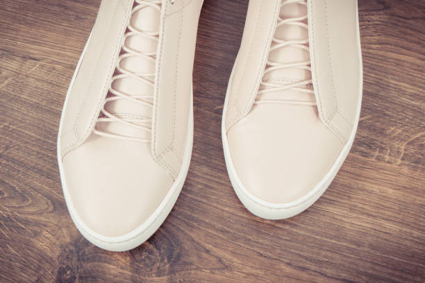 vintage photo, womanly pink leather shoes on rustic board - womanly imagens e fotografias de stock