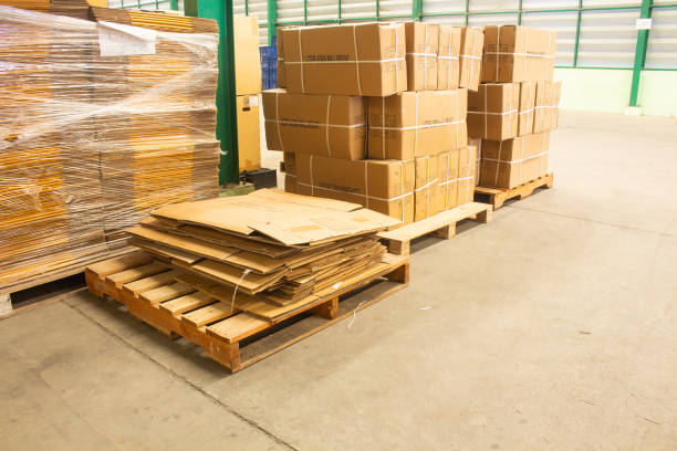 istock Old paper boxes on pallet for sale or reuse 1302208408