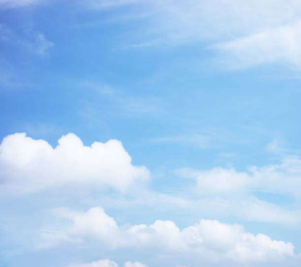 istock Blue sky background and white clouds soft focus, and copy space 1302210511