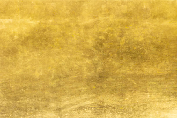 istock Gold abstract background or texture smooth and gradients shadow. Soft focus 1302210552