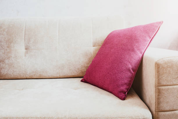 istock Pink pillow on a soft sofa - a place for daytime sleep 1302211608