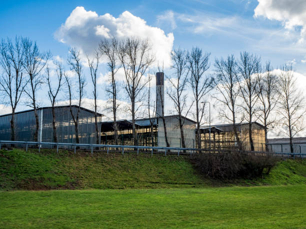 istock factory building with blue sky 1302212826