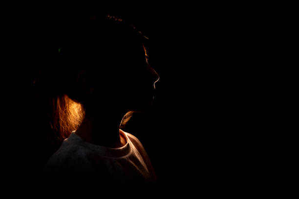 istock Little girl portrait with back light 1302217124