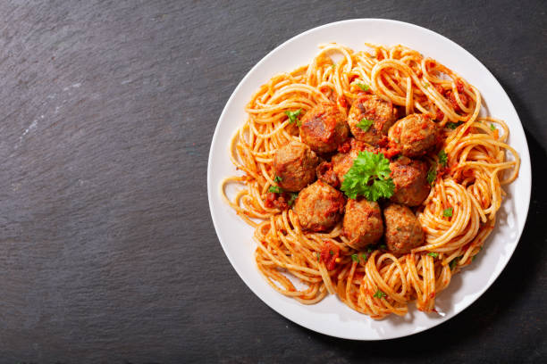 istock plate of pasta with meatballs, top view 1302217403