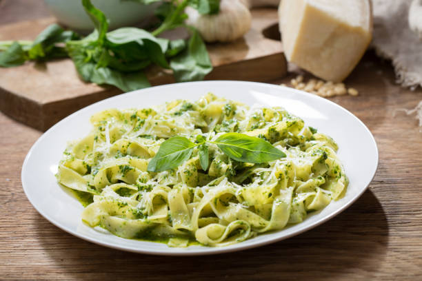 istock plate of pasta with pesto sauce 1302217414