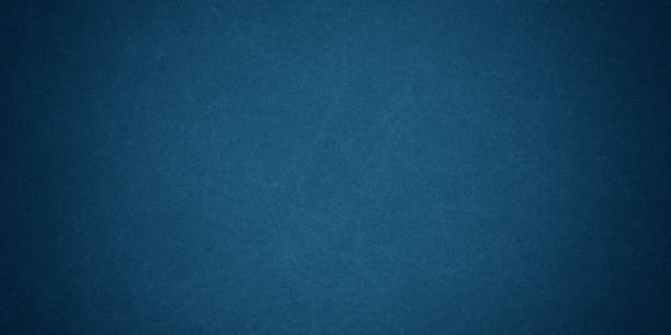 istock Texture of old navy grunge blue paper closeup background 1302218821