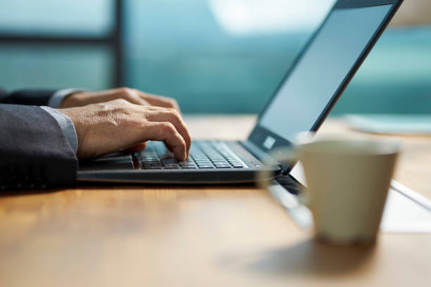istock asian business man working in office using laptop 1302220292