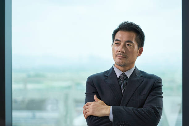 istock asian business executive thinking in office 1302220296