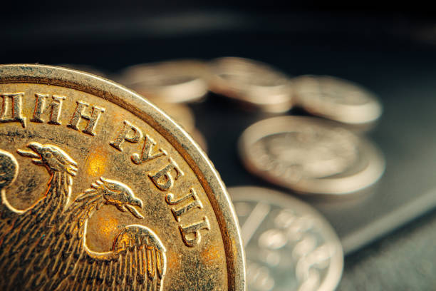 istock Russian rouble coin on dark background close up 1302224919