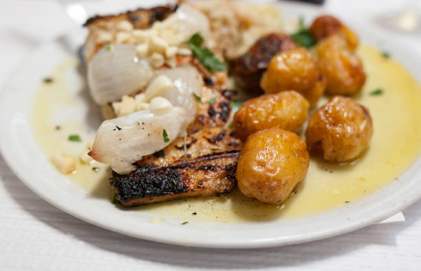 Roasted codfish with potatoes or Bacalhau a Bras