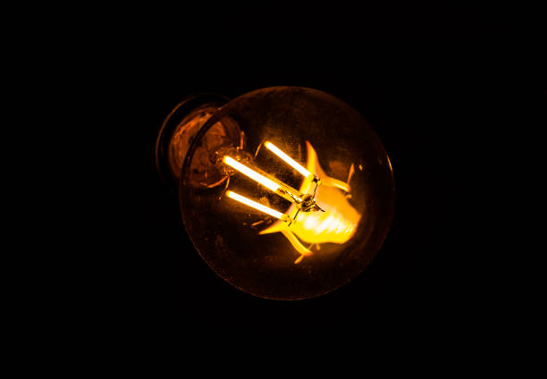 istock Modern lamp flickers in a loft-style interior. Beautiful design idea. 1302228182