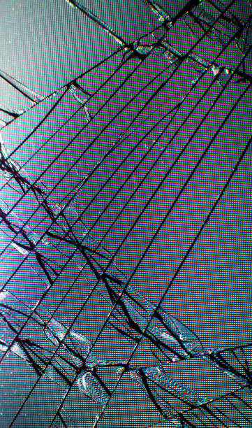 istock Broken glass texture. Close up photo. 1302229180