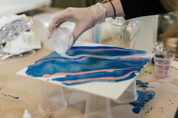 work on a workshop to create resin art.