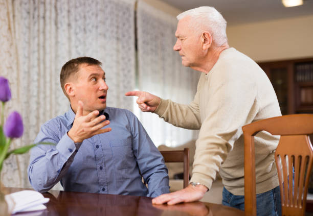 istock Man and his adult son having conflict 1302234561