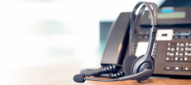 istock Communication support, call center and customer service help desk. VOIP headset for customer service support (call center) concept 1302235349