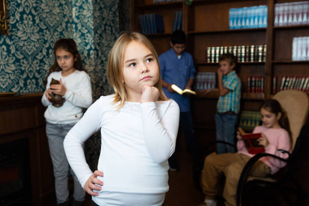 istock Positive girl is thinking about solving the problem in quest room 1302236130