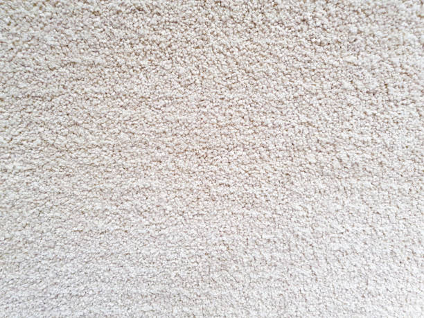 istock Gray long pile carpet texture background. Polypropylene long pile carpet, close-up, top view 1302240317