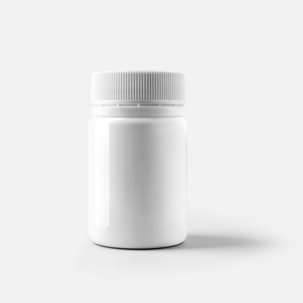 istock Mockup of a white plastic jar with a round lid, for vitamin, tablets, pills, container isolated on background. 1302243305