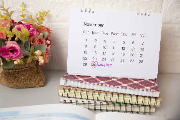 istock 2021 Calendar desk and diary for Planner and organizer to plan and reminder daily appointment, meeting agenda, schedule, timetable, and management of wedding day. Calendar reminder event Concept. 1302244263