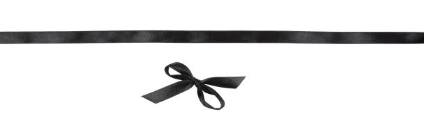 istock Black satin bow and ribbon 1302248836