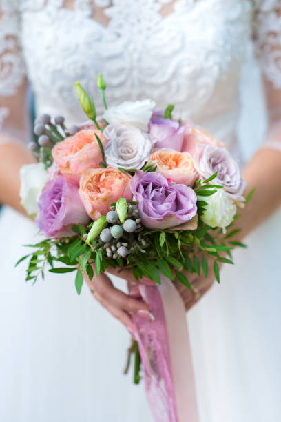 istock Wedding bouquet of delicate fresh roses close-up 1302249216