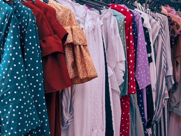 istock Women's dresses at the market. 1302251918