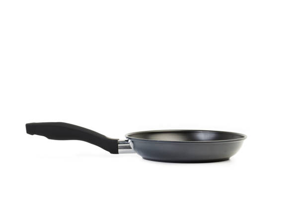 istock A black frying pan on a white background 1302253002