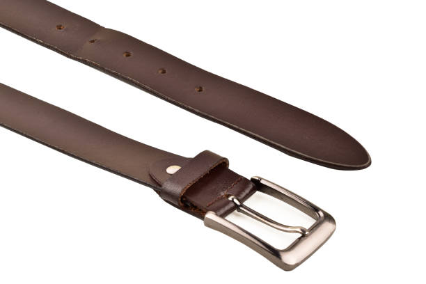 istock Old wrinkled leather belt isolated on white background with clipping path 1302254386