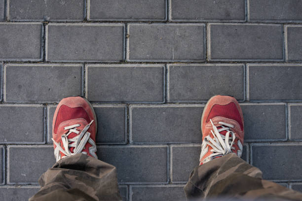 istock Men Standing on the Floor Tiles 1302256188