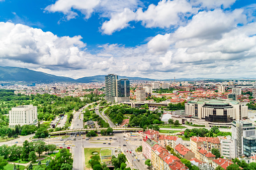 Wide aerial drone shot of  Sofia city, Bulgaria -  (Bulgarian : София, НДК НАционален дворец на културата). The picture was taken at day time with DJI Phantom 4 Pro drone / quadcopter.